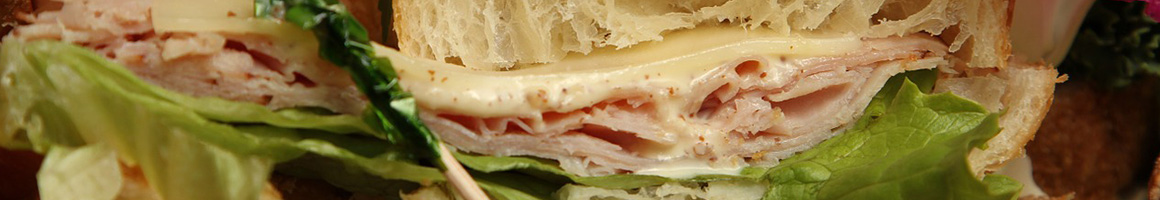 Eating Sandwich Cafe at Brewed Awakenings Cafe restaurant in Saline, MI.